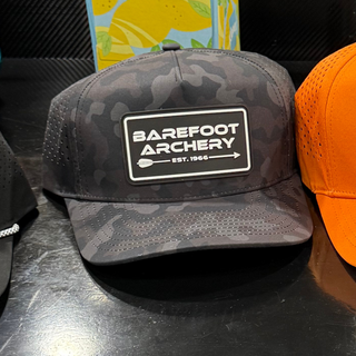 barefoot archery logo patch on a black camo hat