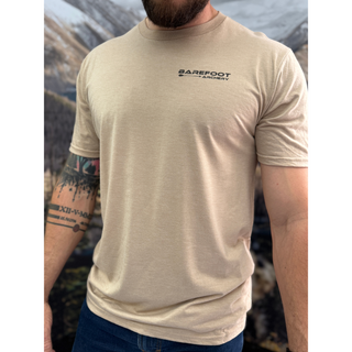 man wearing barefoot archery flagship tee
desert tan front view