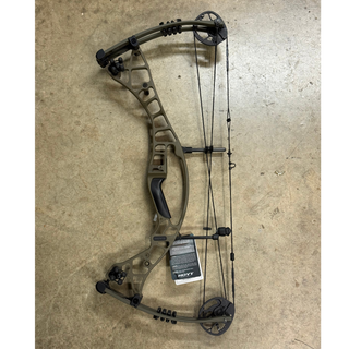 Compound bow on a concrete floor with Hoyt tag