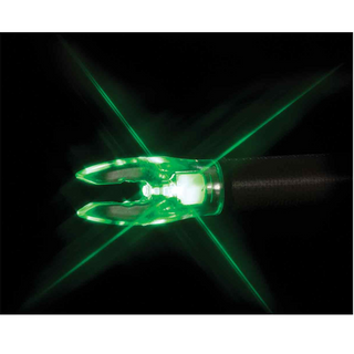 Close-up of a glowing green arrow nock on a black background