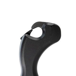 closeup of black button release on a white background