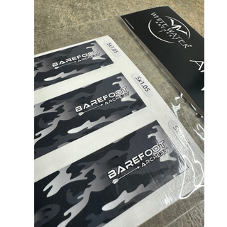 black camo f barefoot logo arrow wraps in package close up on cement background