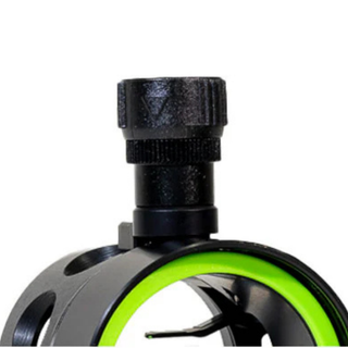 Close-up of a black and green sight on a white background