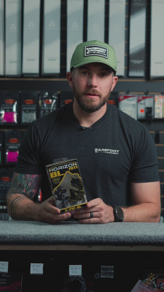 man behind the counter at an archery shop talking about the Horizon Bridgelock