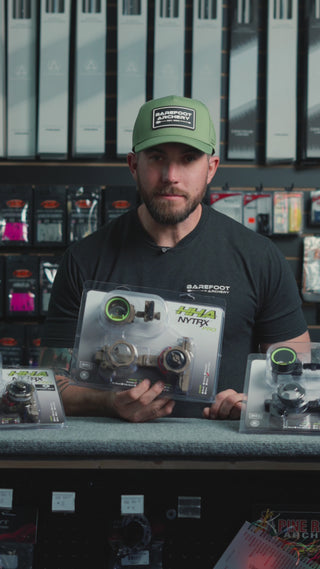 man behind the counter at an archery shop talking about the HHA Nytrx Pro