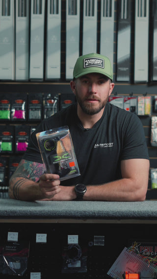 man behind the counter at an archery shop talking about the HHA Optimizer Lite