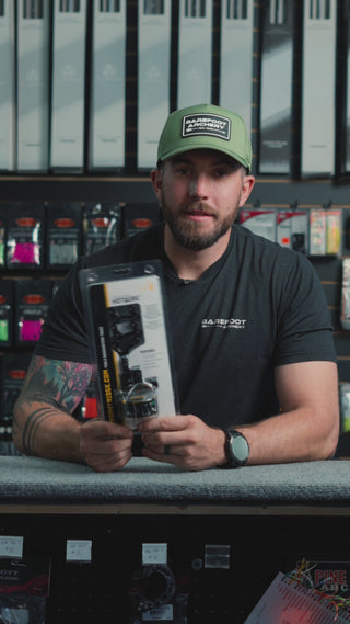 man behind the counter at an archery shop talking about the Trophy Ridge Hotwire