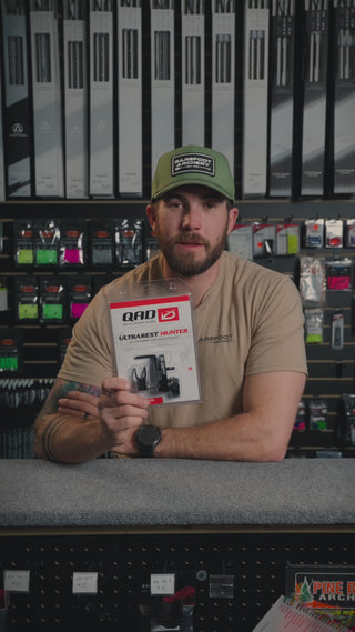 man behind the counter at an archery shop talking about  QAD Ultrarest Hunter