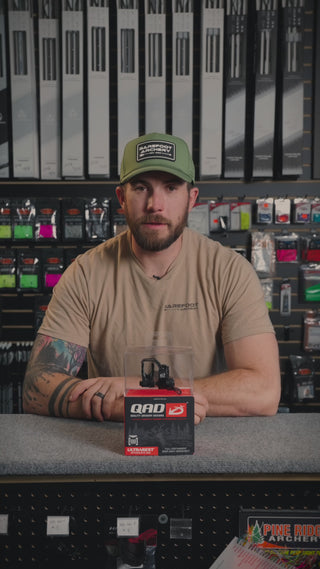 man behind the counter at an archery shop talking about the QAD Ultrarest