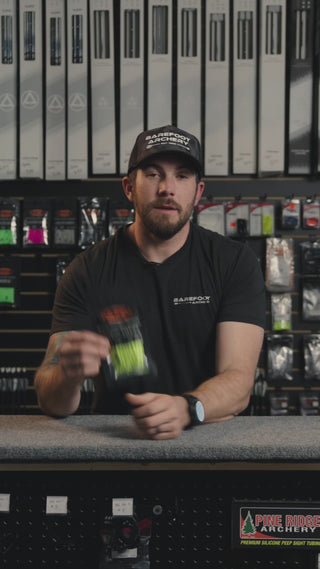 man behind the counter at an archery shop talking about he AAE Hybrid 26 Vanes