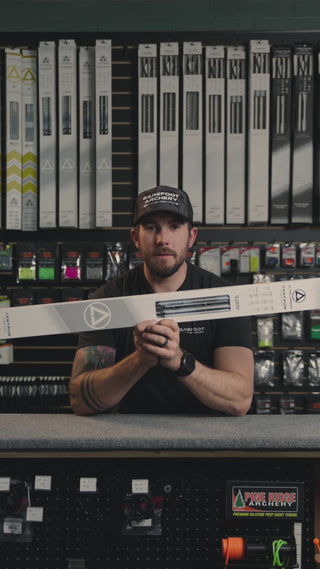 man behind the counter at an archery shop talking about Centrum Premier 27 arrows